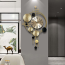 Sculptural Gold Orbit Wall Clock