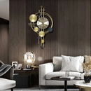 Sculptural Gold Orbit Wall Clock
