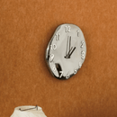 Distorted Face Wall Clock